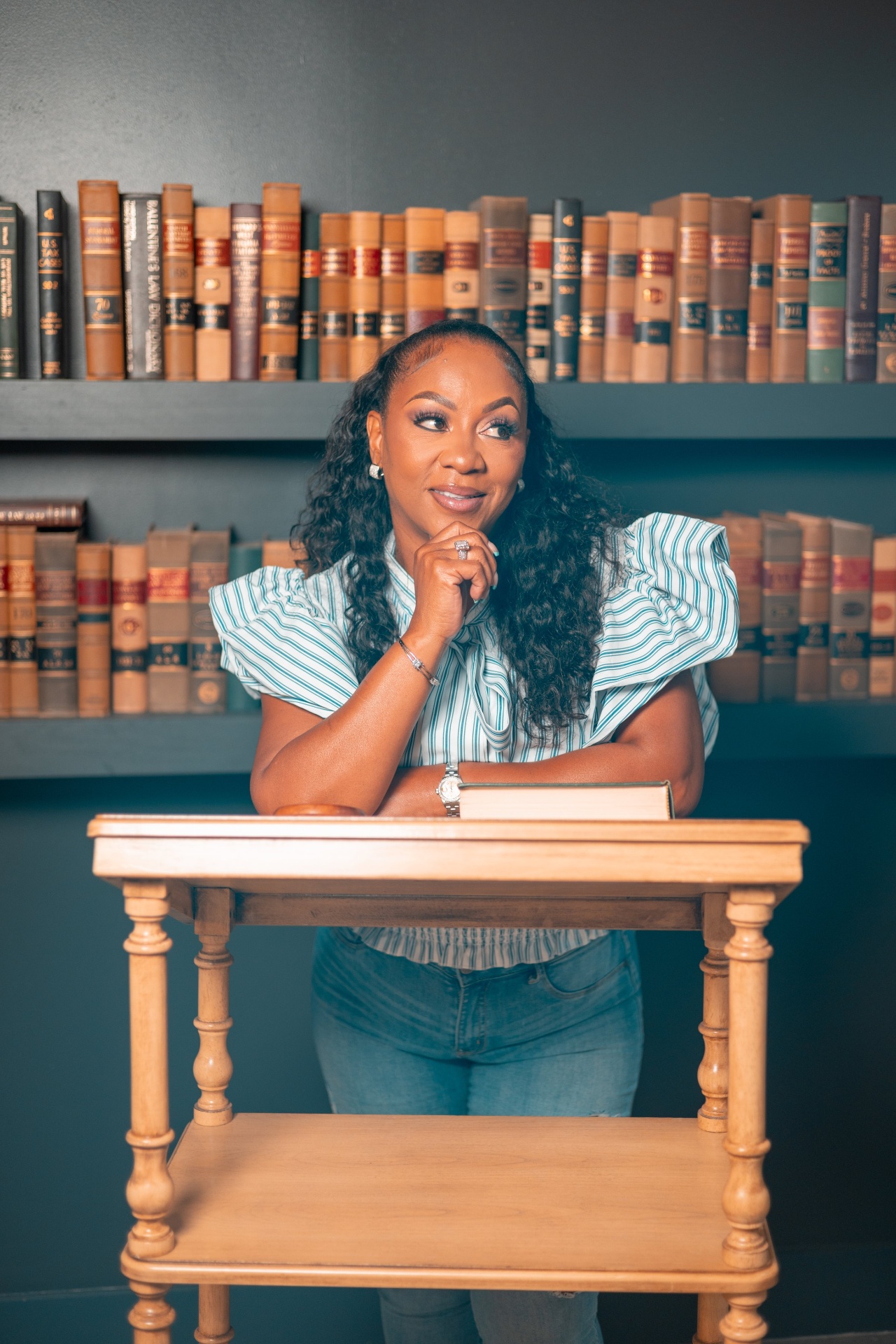 LaTisia McDonald in her library